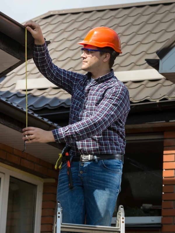SEAI-registered BER assessor measuring a property in Cork